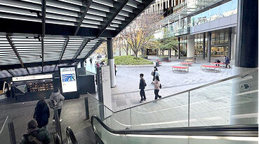 FAfter getting off the escalator, walk toward the entrance of GRAND FRONT OSAKA (South Building)