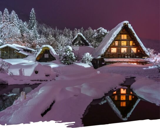 Gassho style houses reflected on the surface of the water