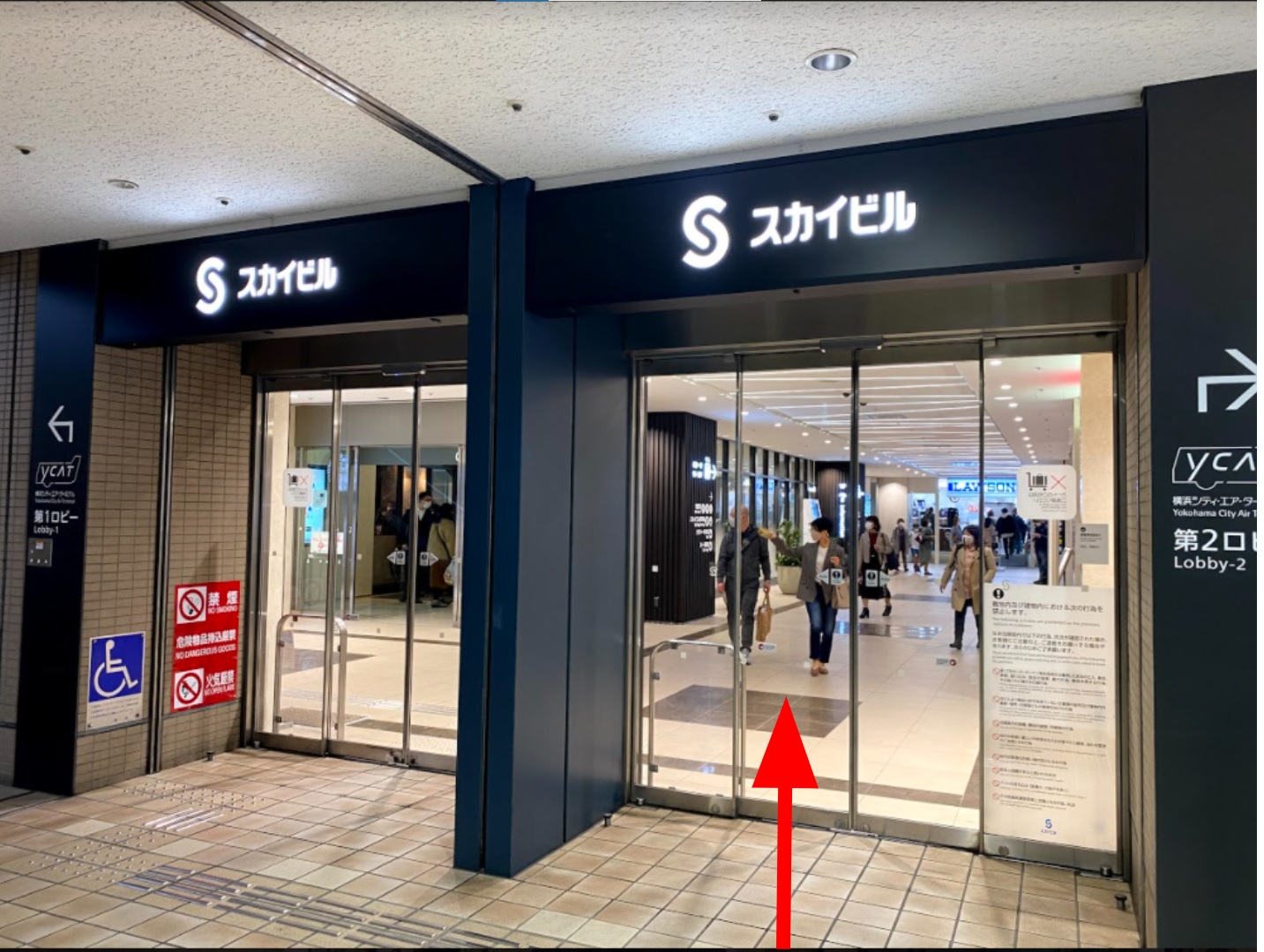 Go up to escalator number 8, then enter the Sky Building on your right.